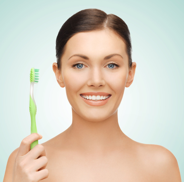 Woman with toothbrush - Photo, image
