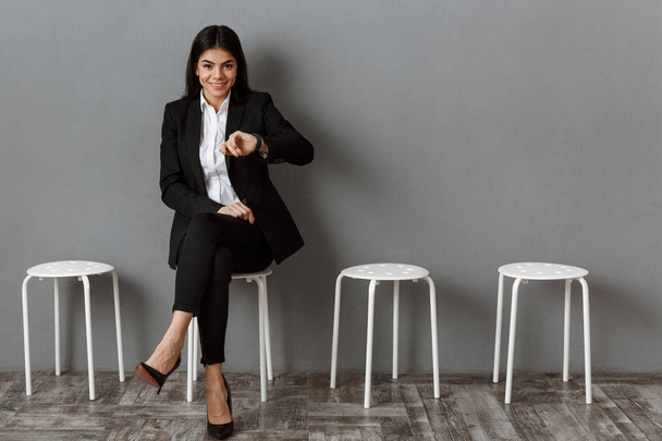 smiling businesswoman in suit waiting for job interview - Fotoğraf, Görsel