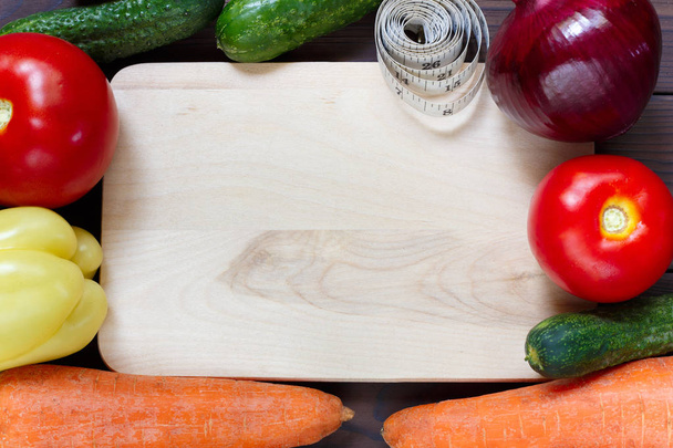 Fresh organic vegetables with measuring tape, free space for tex - Photo, Image