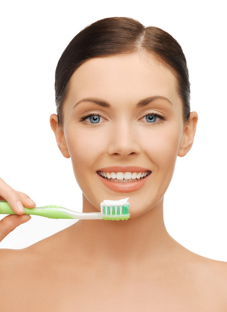 Woman with toothbrush - Photo, image