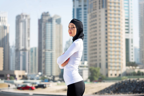 Arabian woman training outdoors - Foto, Imagen