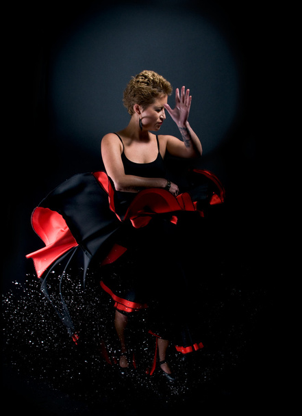 Portrait of beautiful young woman dancing flamenco splashing wat - Zdjęcie, obraz