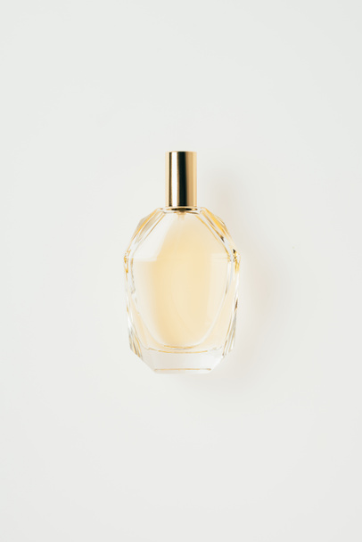 top view of glass bottle of perfume isolated on white  - 写真・画像