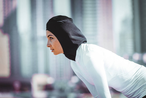 Arabian woman training outdoors - Foto, imagen