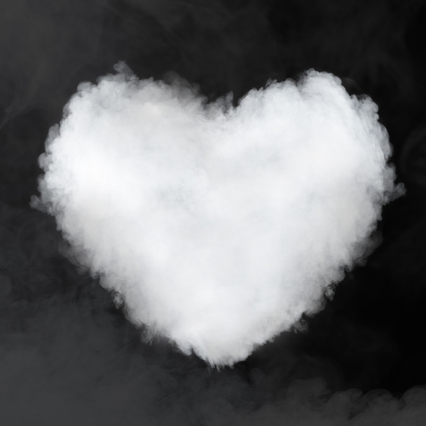 heart shaped cloud isolated on black - Photo, Image