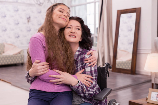 Inspired disabled woman and girl spending day - Foto, Imagem