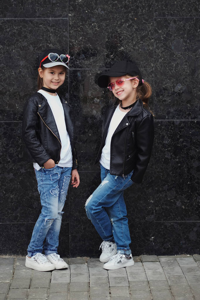 stylish funny little girls on the street - Foto, Imagen