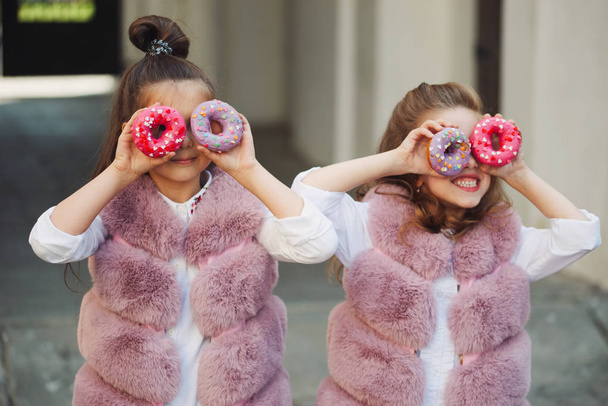 stylish funny little girls on the street - Foto, immagini