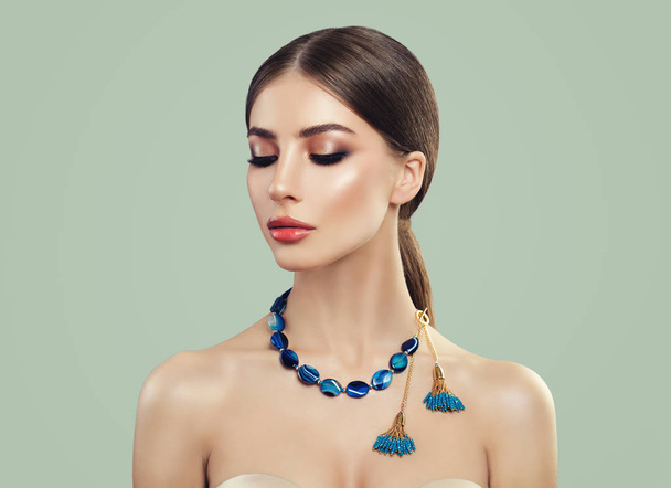 Beautiful Woman wearing Blue Jewelry Necklace - Photo, Image