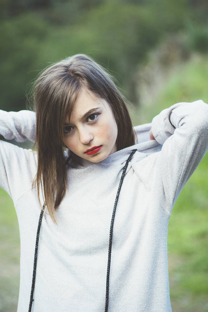 Portrait of teenage girl with sports clothes - Photo, Image