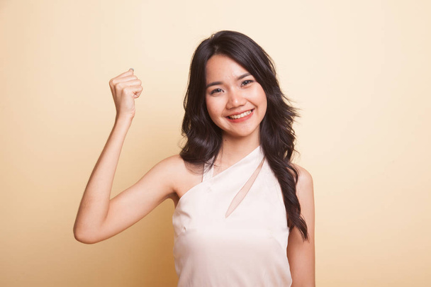 Successful  young Asian woman hold fist up. - Valokuva, kuva