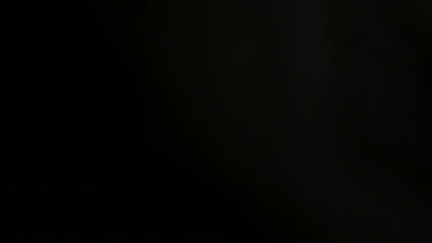 Hermosa fuga de luz en Ultra Alto sobre fondo oscuro con destello de lente Real
  - Imágenes, Vídeo