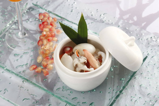 Closeup of bowl with seafood soup on table - Zdjęcie, obraz