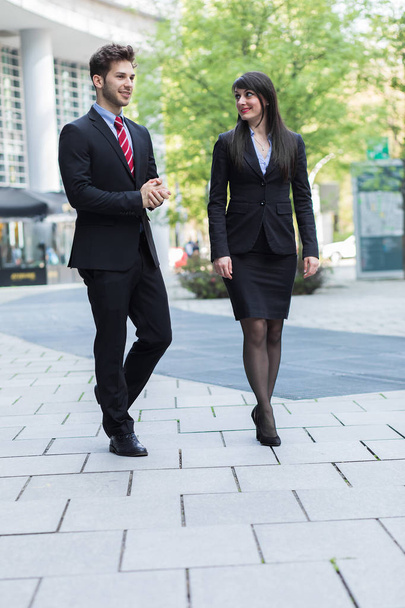 Business partners walking outdoor - Foto, imagen