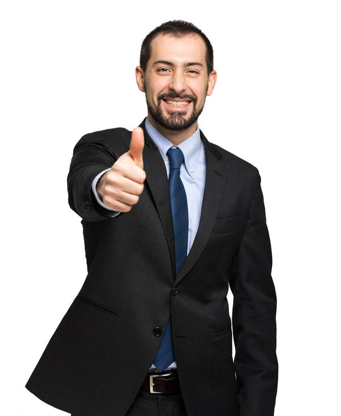 handsome businessman showing thumbs up - Φωτογραφία, εικόνα
