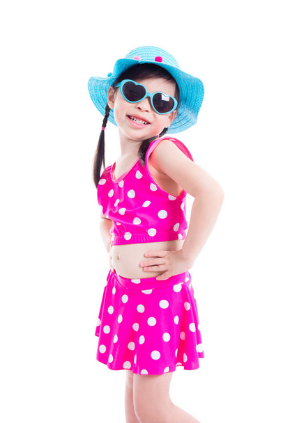 Little girl in swim suit smiling over white  - Foto, Imagen