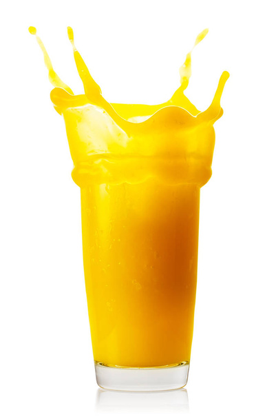 Splash of orange juice in glass - Photo, Image