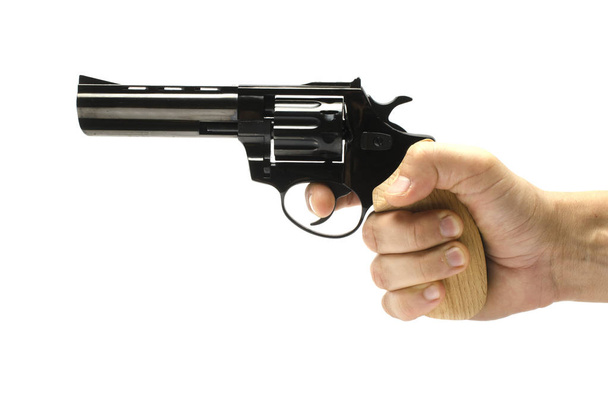 Revolver, gun, pistol in hand isolated on white - Photo, Image
