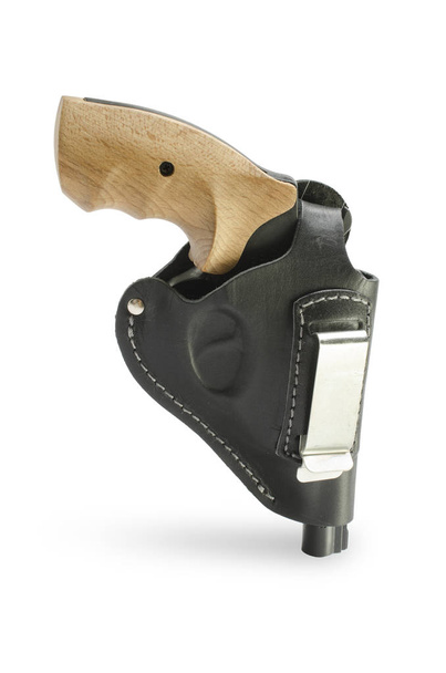 revolver in a leather black holster isolated - Foto, immagini
