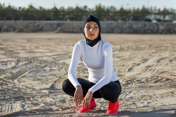 Arabian woman training outdoors - Фото, изображение