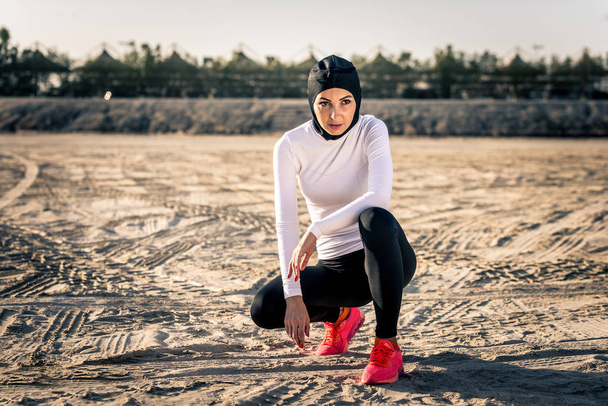 Arabian woman training outdoors - 写真・画像