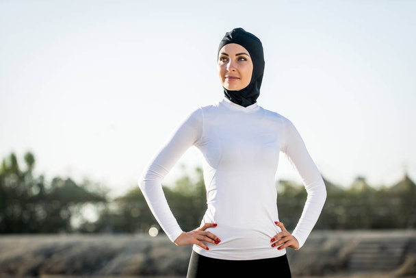 Arabian woman training outdoors - Фото, изображение