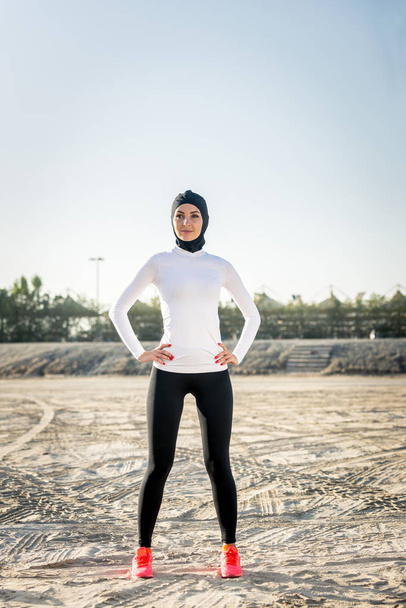 Arabian woman training outdoors - Photo, image