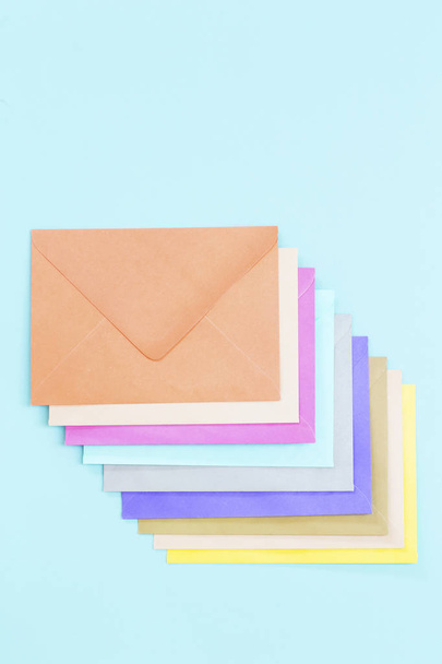 Colorful envelopes on blue - Foto, Bild