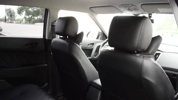 Armchairs in car and headrests made of leather. - Footage, Video