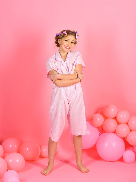 Little girl with balloons on pink background - Foto, Imagem