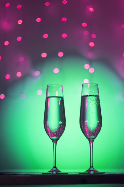 Champagne glasses in disco party bar - Valokuva, kuva