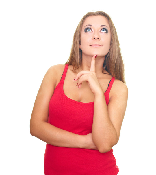 Happy young woman in a red shirt. Woman holds her finger on her - Photo, Image