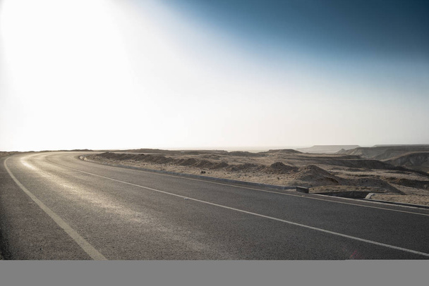 Asphalt road of the Namibe Desert. Africa. Angola. - Photo, Image