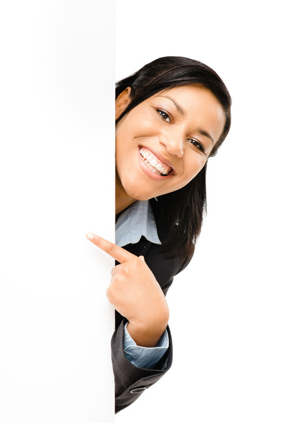 Happy mixed race business woman pointing at empty copy space iso - Zdjęcie, obraz