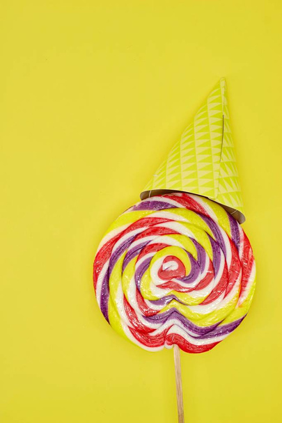A studio photo of a lollipop - Фото, изображение