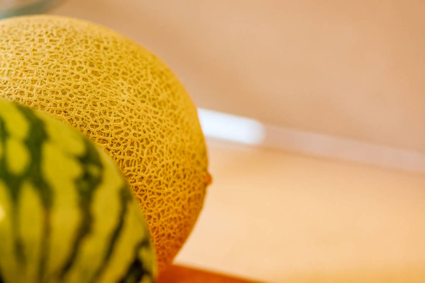Cantaloupe Atrás da melancia
 - Foto, Imagem