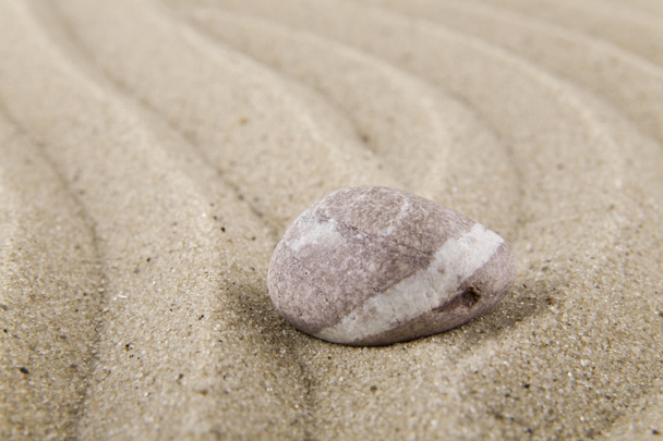 a homok, a háttérben relaxációs kövek - Fotó, kép