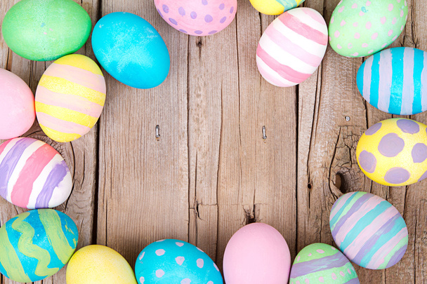 Easter eggs on a wooden background - Foto, imagen