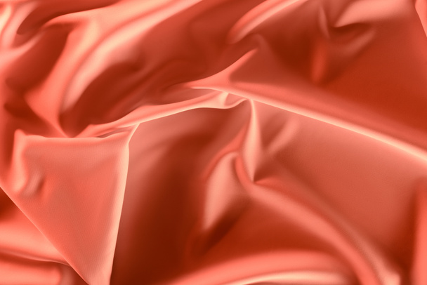 close up view of elegant pink silky fabric as background - Foto, imagen