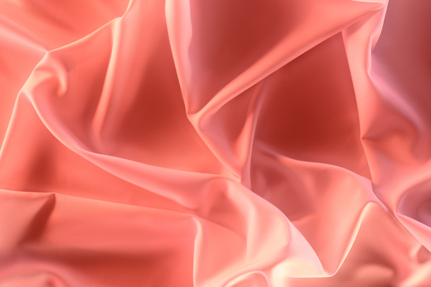 close up view of elegant pink silky fabric as background - Foto, Bild