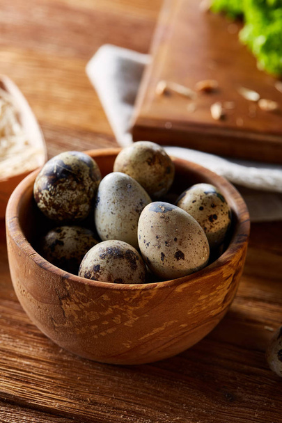 Preparation for making healthy salad with quail eggs, top view, close-up, selective focus - Valokuva, kuva