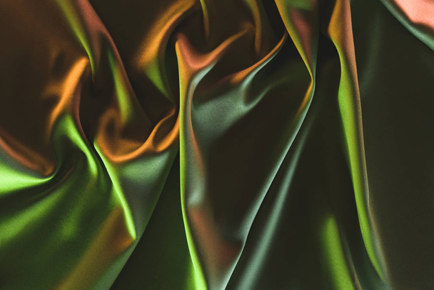 close up view of dark crumpled silk cloth as backdrop - Photo, Image