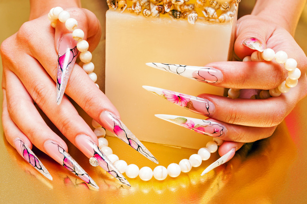 Artificial nails and pearls - Photo, Image
