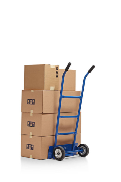 Hand truck loaded with boxes isolated on white background - Photo, Image