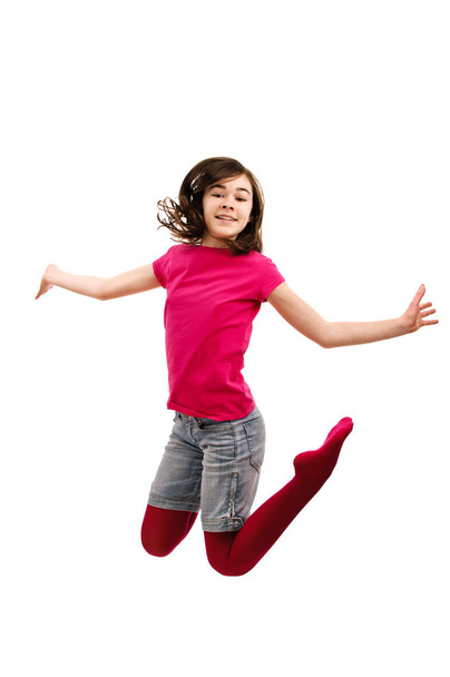 Girl jumping isolated on white background - Fotó, kép