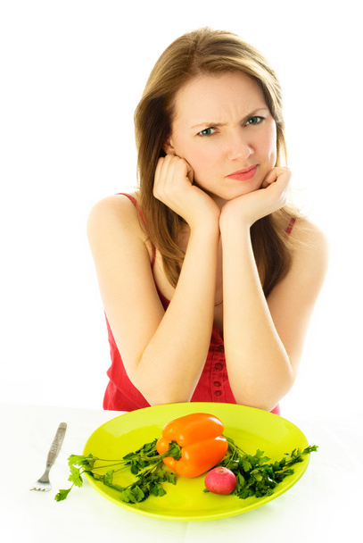Displeased woman keeping a diet - Photo, image
