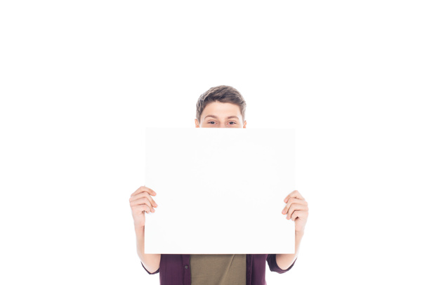 obscured view of teenager with empty banner in hands isolated on white - Фото, зображення