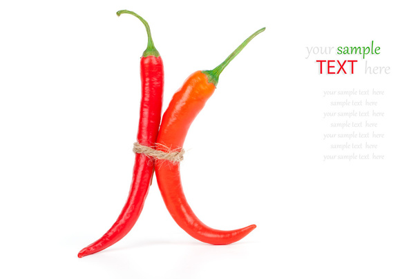 Hot red chili pepper isolated on white - Foto, afbeelding