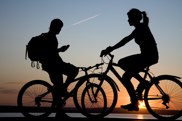 Two bicycler on sunset - Foto, Bild