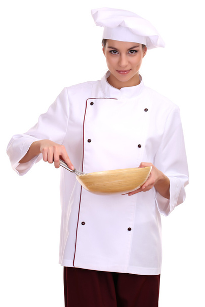 Portrait of young woman chef with wisk isolated on white - Fotó, kép